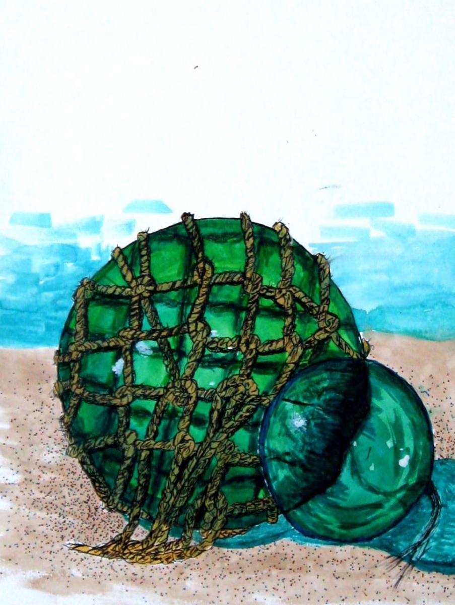 Glass ball with fishing net around it. Small glass ball behind.