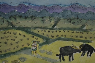Field with two cows and a person.