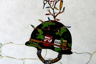 Military helmet with holiday lights on it.